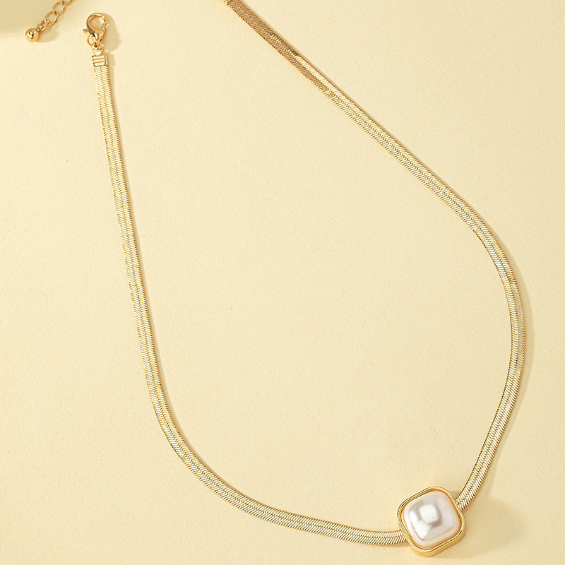 SNAKE BONE PEARL NECKLACE